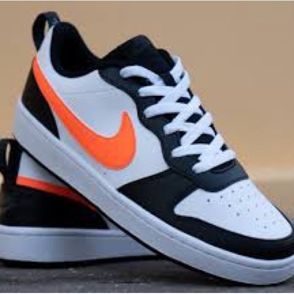 Nike Black and Orange Sneakers with Classic Low-Top Design - Picture 1 of 4